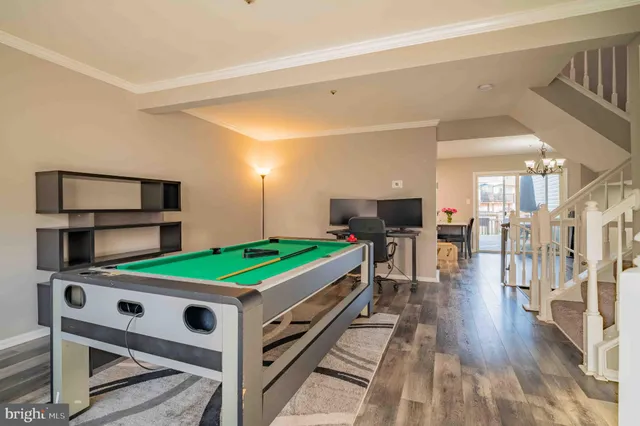 a room with furniture and a flat screen tv