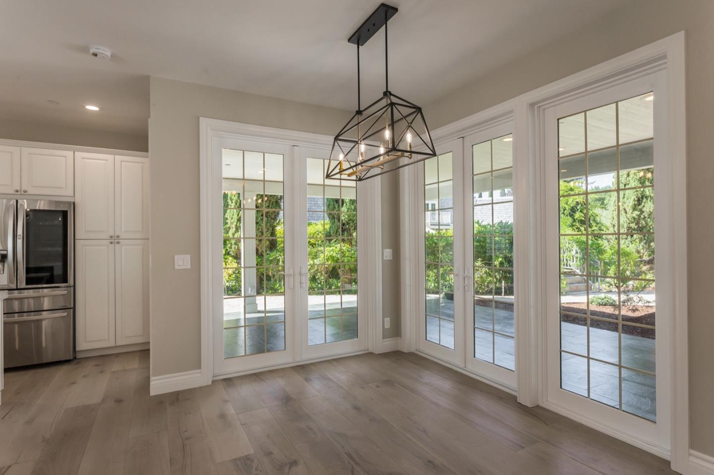 11 A Cowell Lane Atherton, CA 94027 - Photo 11 of 35 a view of livingroom with furniture wooden floor and windows