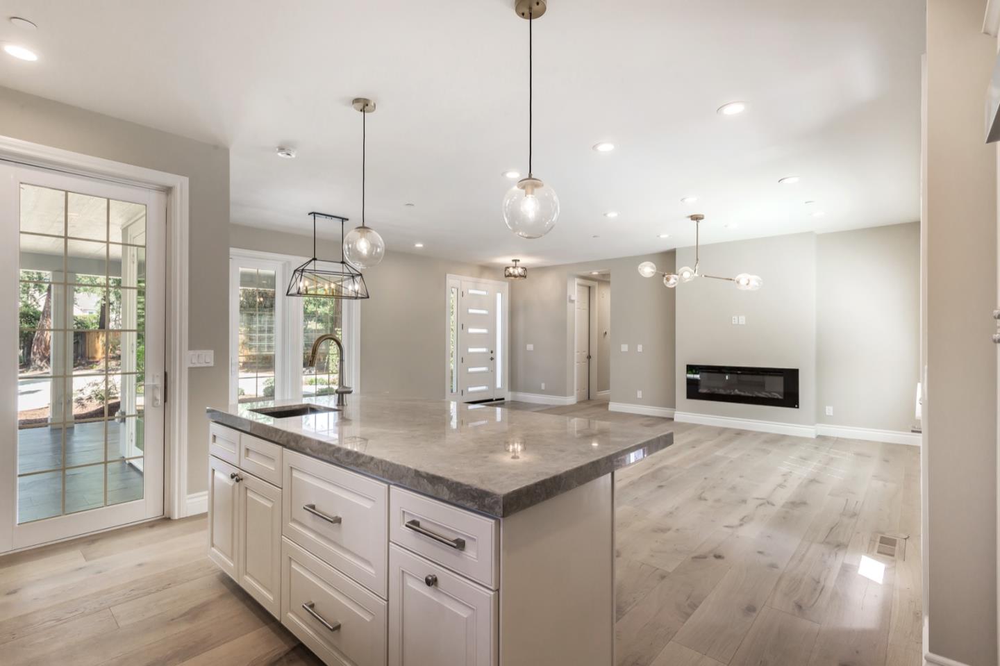 11 A Cowell Lane Atherton, CA 94027 - Photo 18 of 35 a view of a kitchen with a sink and chandelier