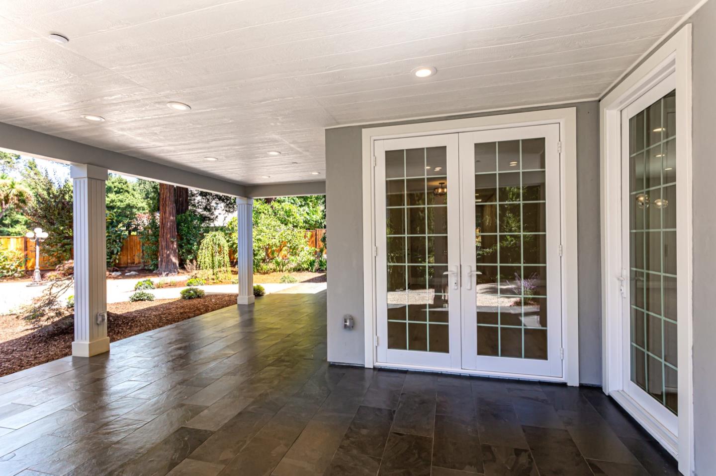 11 A Cowell Lane Atherton, CA 94027 - Photo 32 of 35 a view of empty room with wooden floor and windows