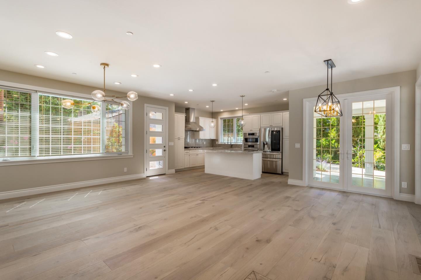 11 A Cowell Lane Atherton, CA 94027 - Photo 6 of 35 a view of an empty room with kitchen and window