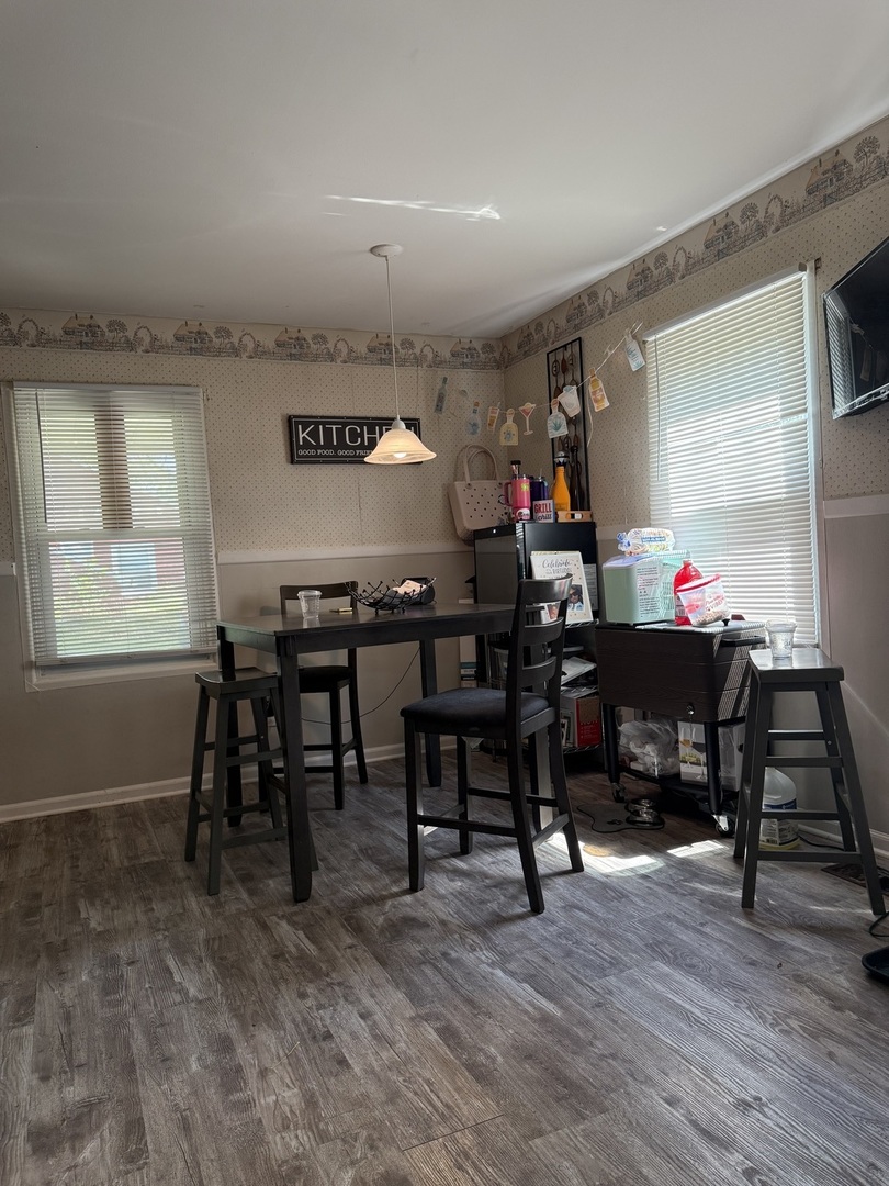 1908 215th Place Sauk Village, IL 60411 - Photo 8 of 11 a view of a a dining room with furniture window and wooden floor