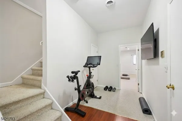 a view of a room with gym equipment