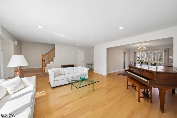 a living room with furniture and a table