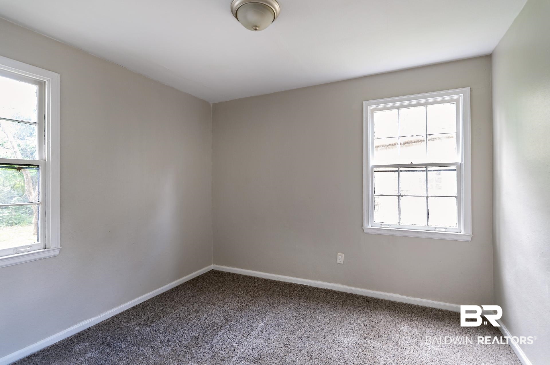 1869 Mott Drive West Mobile, AL 36617 - Photo 19 of 34 Carpeted empty room featuring baseboards