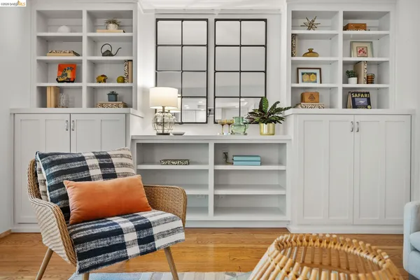 a room with furniture cabinets and window