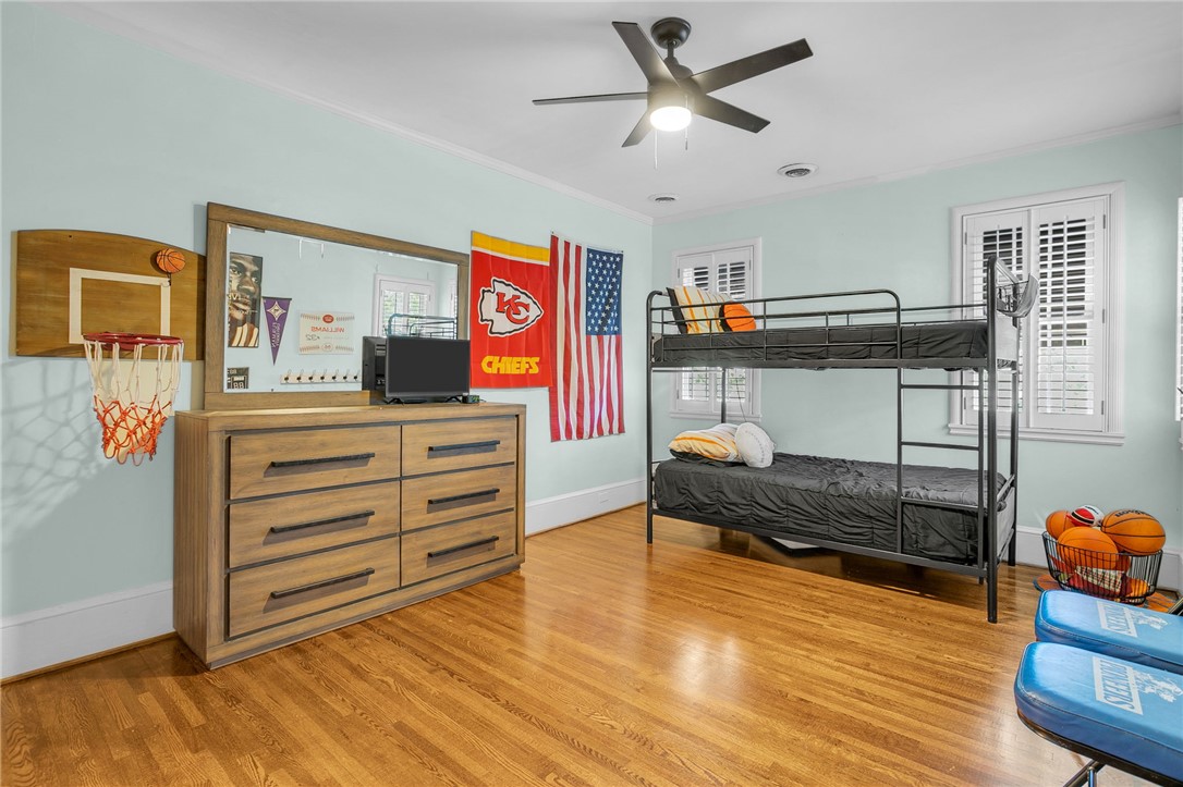1107 Springdale Road Anderson, SC 29621 - Photo 21 of 49 This spacious bedroom features classic hardwood floors and ample natural light.