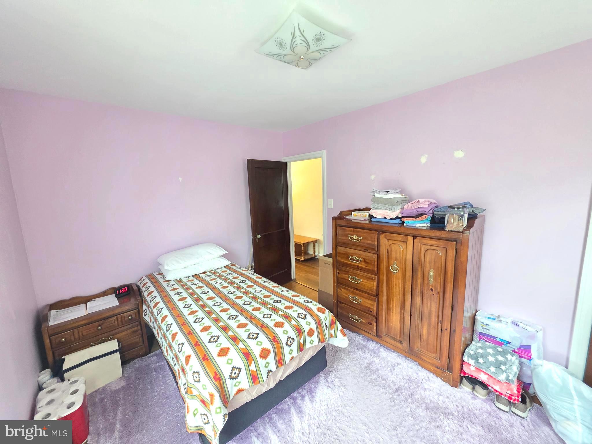 27 George Street Mount Ephraim, NJ 08059 - Photo 14 of 27 a bedroom with a bed and dresser