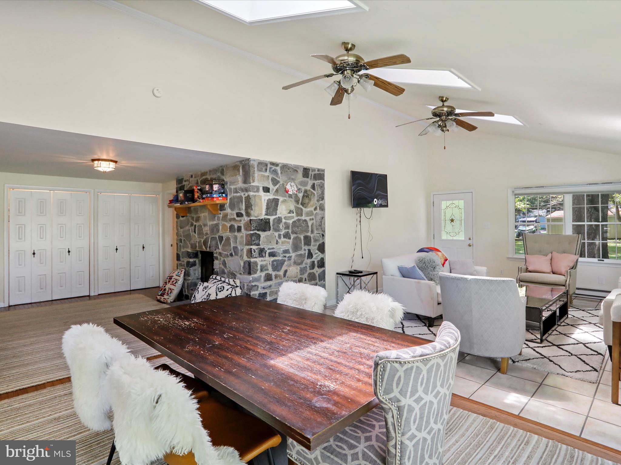 999 Aspero Lane Falling Waters, WV 25419 - Photo 14 of 57 a living room with furniture and wooden floor