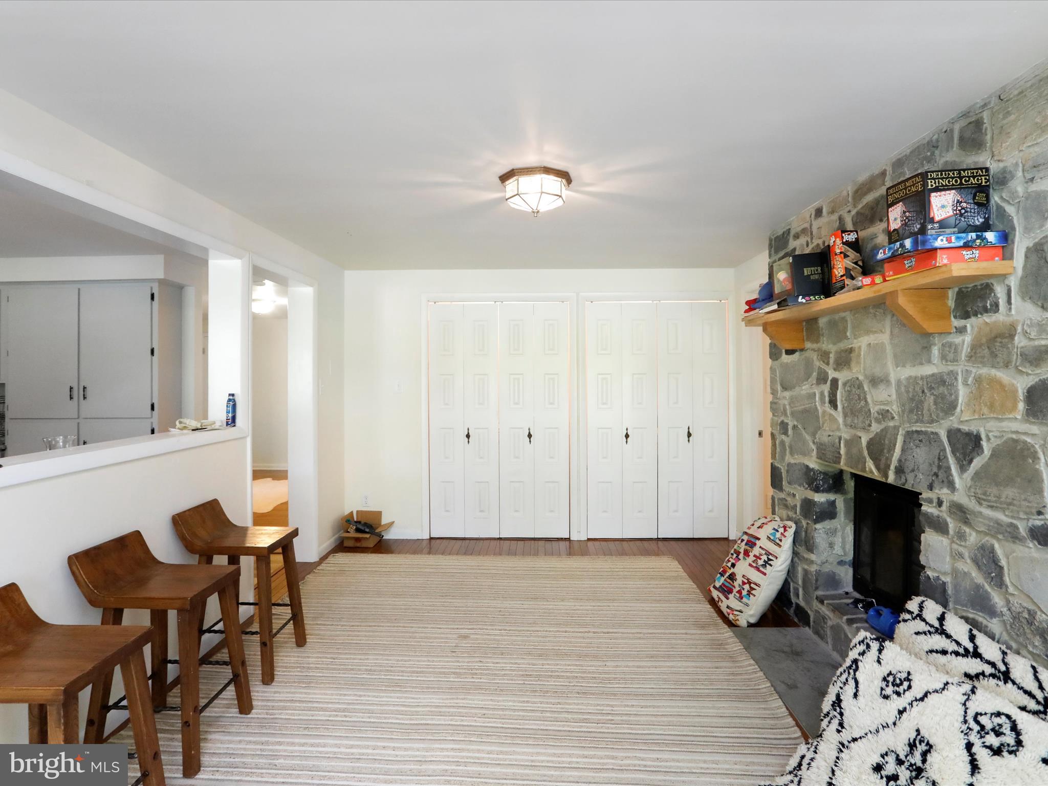 999 Aspero Lane Falling Waters, WV 25419 - Photo 15 of 57 a view of a livingroom with furniture and a fireplace