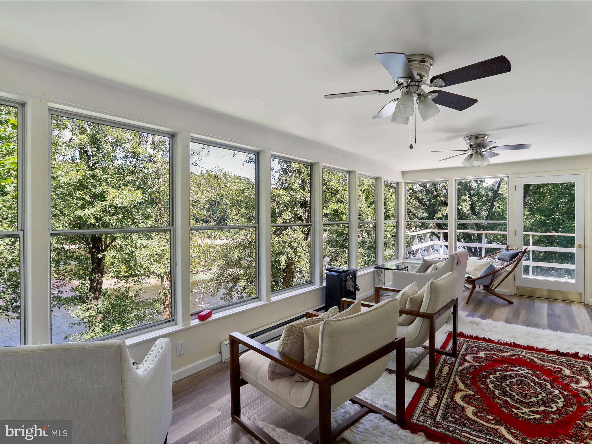 999 Aspero Lane Falling Waters, WV 25419 - Photo 28 of 57 a living room with furniture and a large window