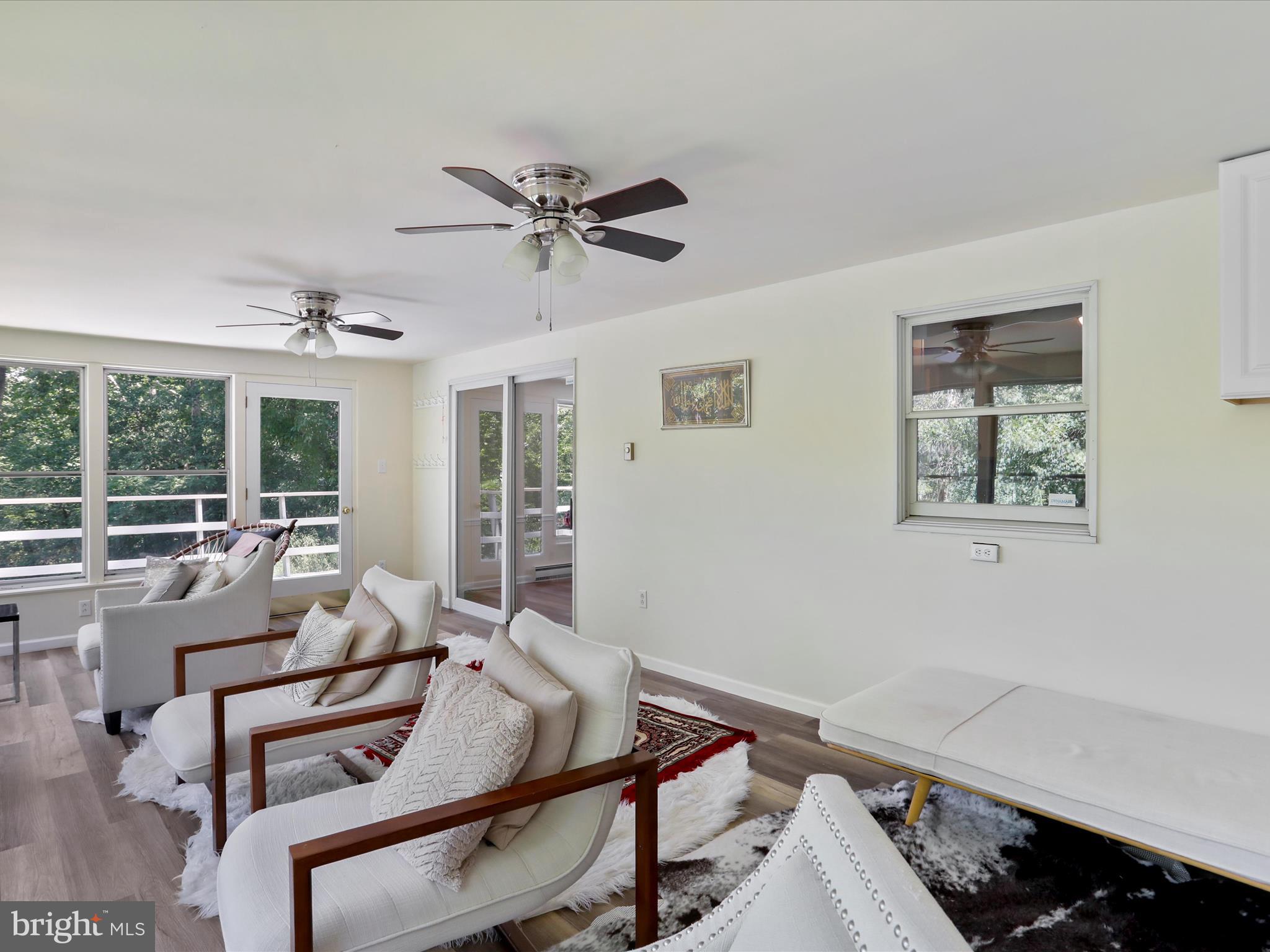 999 Aspero Lane Falling Waters, WV 25419 - Photo 29 of 57 a living room with furniture and a large window