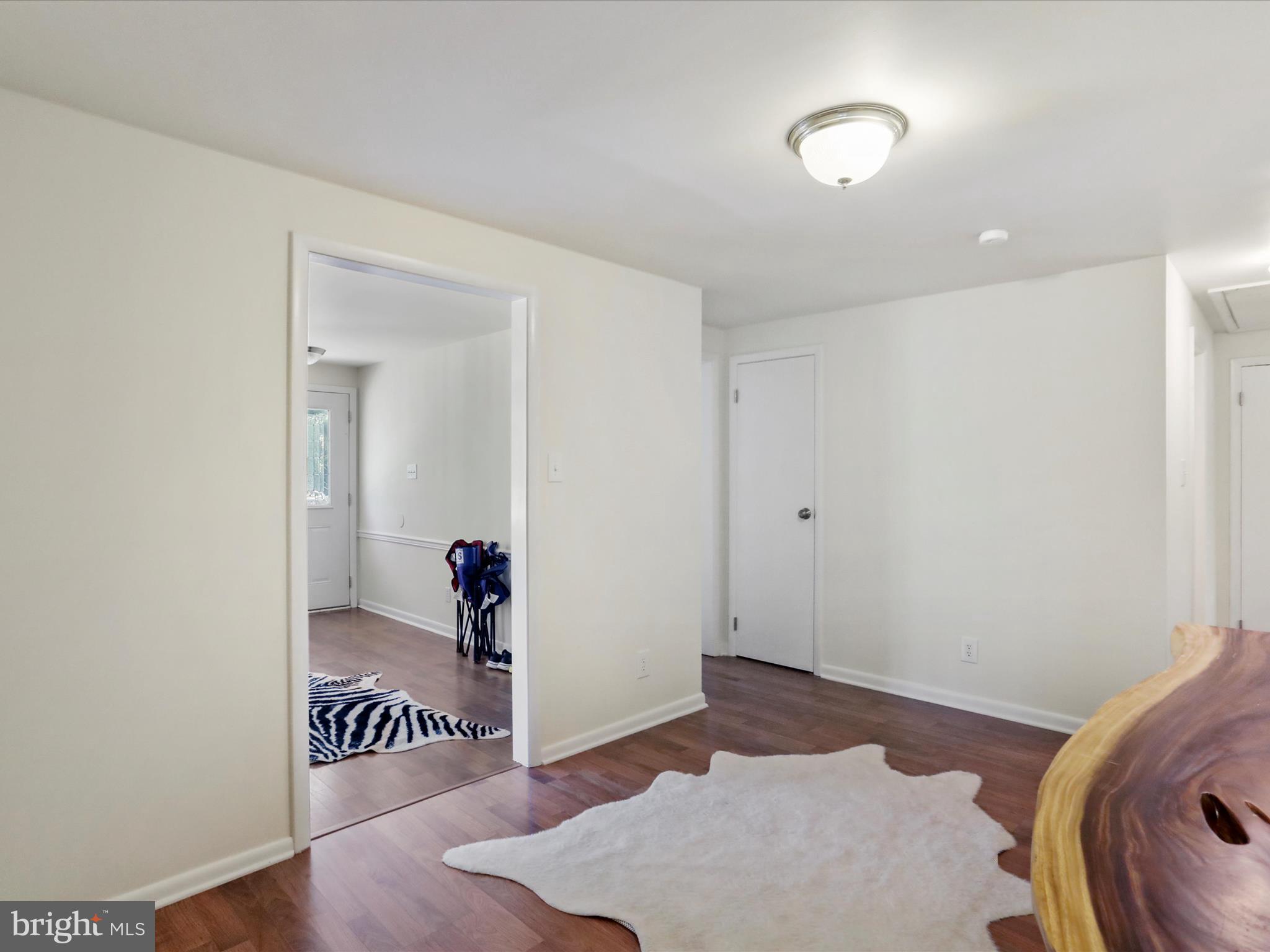 999 Aspero Lane Falling Waters, WV 25419 - Photo 31 of 57 a very nice looking room with a wooden floor