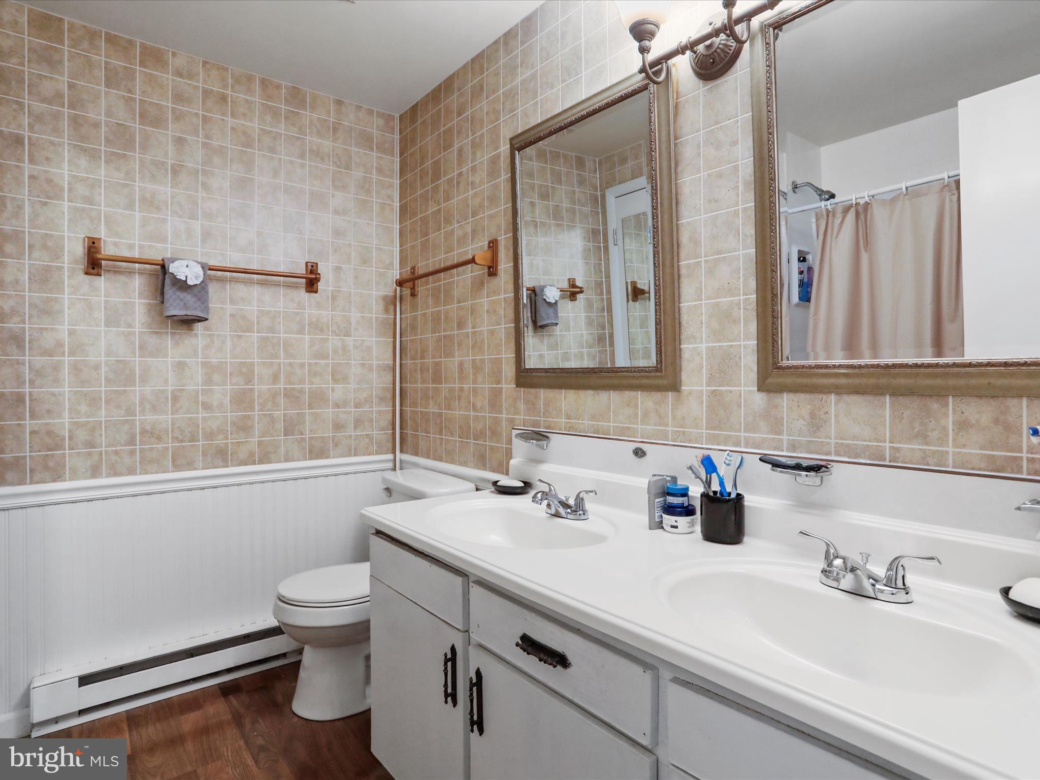 999 Aspero Lane Falling Waters, WV 25419 - Photo 34 of 57 a bathroom with a sink a toilet and shower