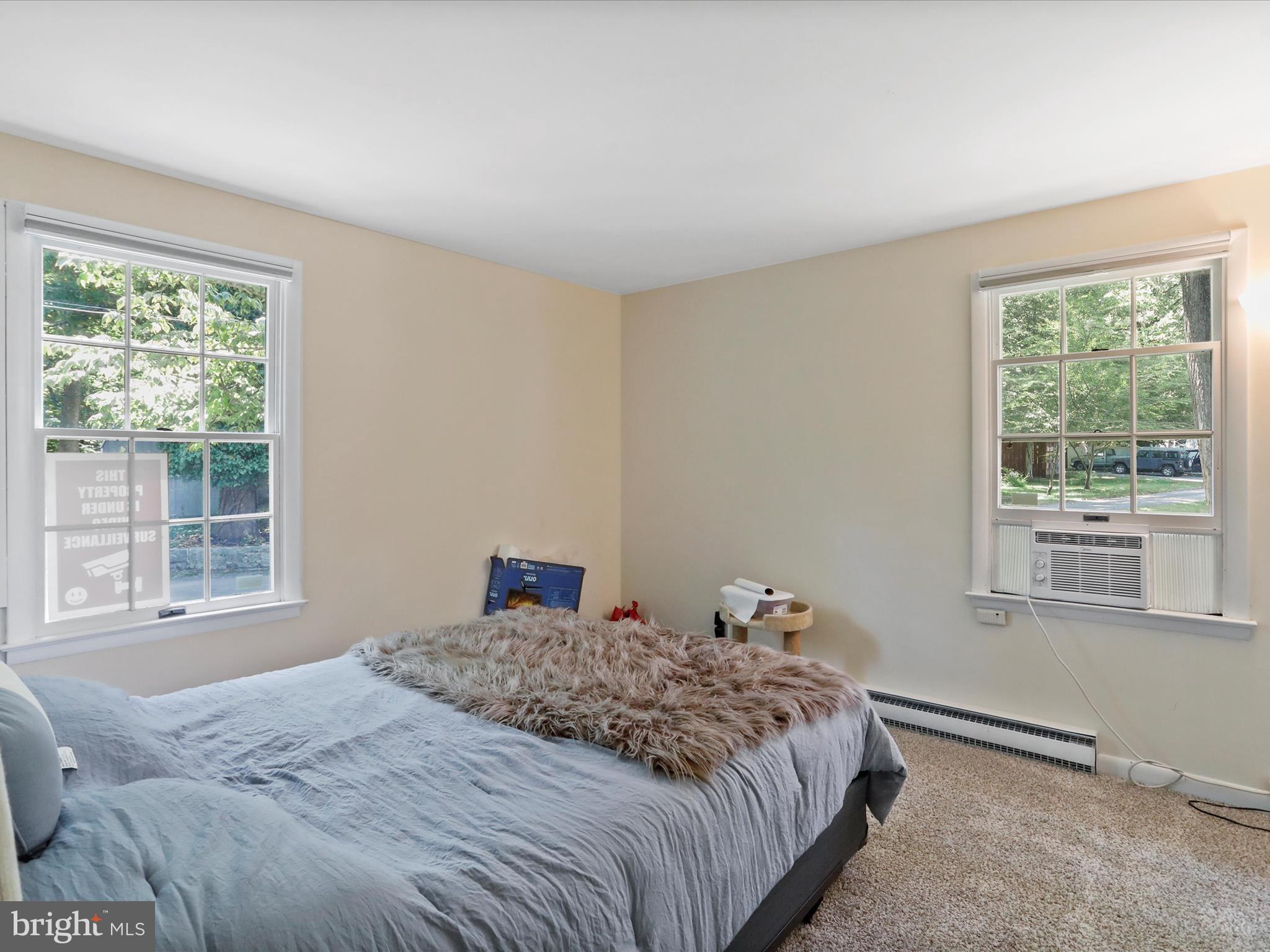 999 Aspero Lane Falling Waters, WV 25419 - Photo 35 of 57 a bedroom with a bed and a window