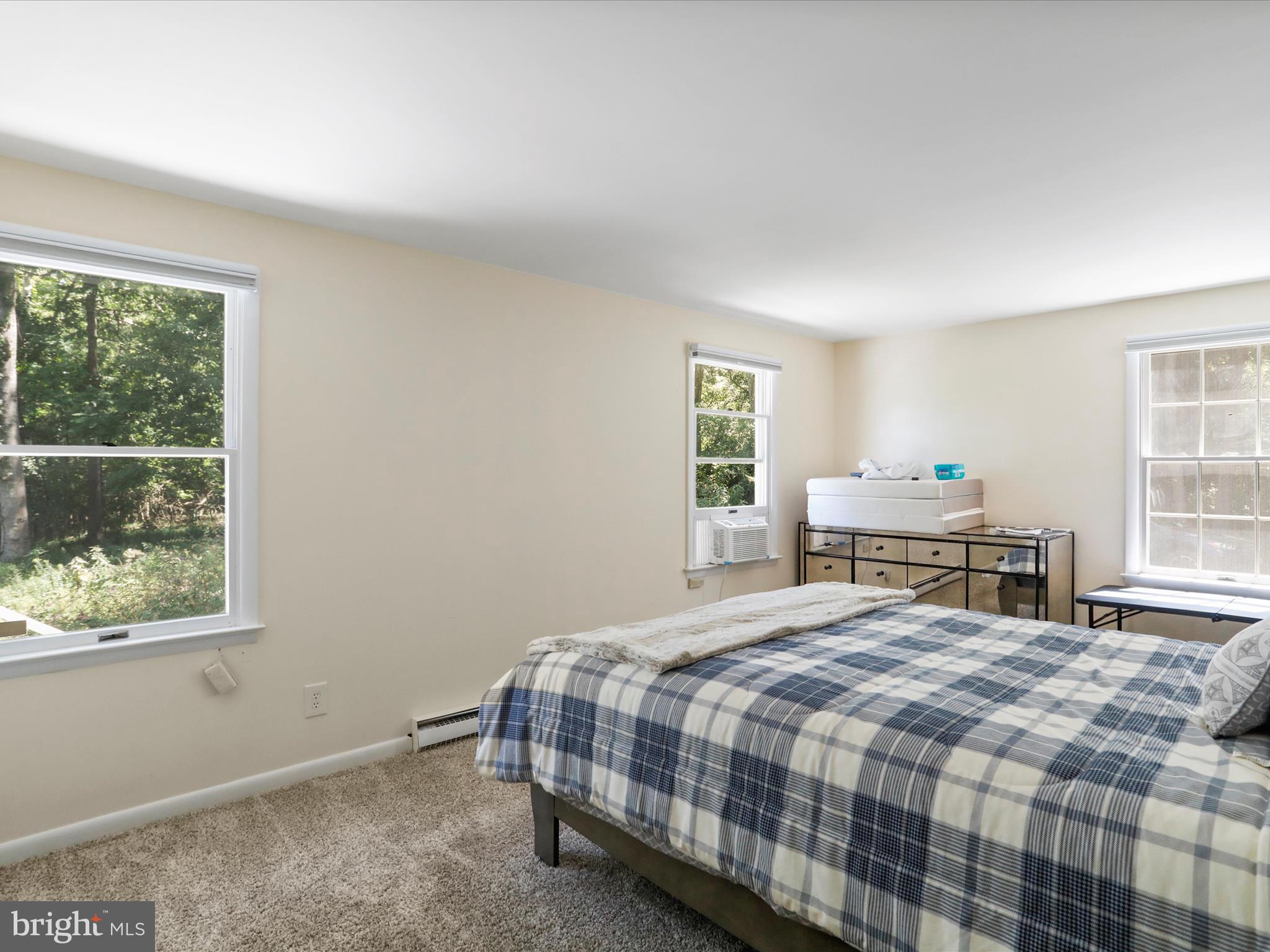 999 Aspero Lane Falling Waters, WV 25419 - Photo 37 of 57 a bedroom with a bed and a window