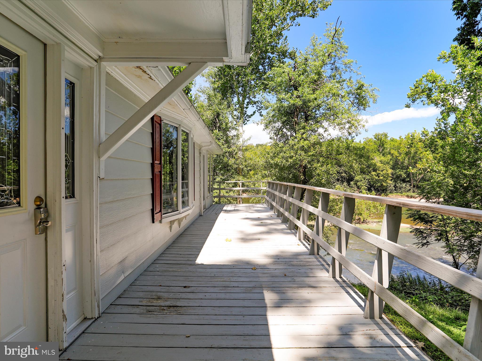 999 Aspero Lane Falling Waters, WV 25419 - Photo 47 of 57 a view of balcony with wooden floor and fence
