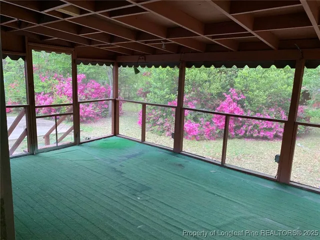 a view of a backyard of the house
