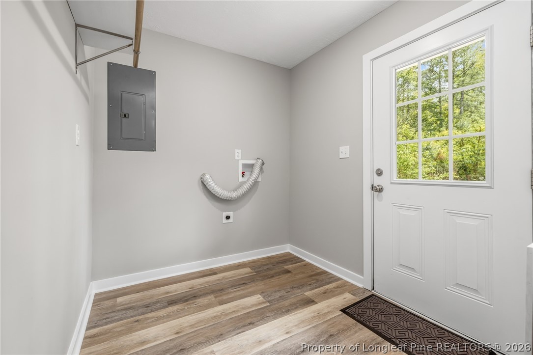 3524 Pine Log Road Lumberton, NC 28360 - Photo 14 of 42 a view of a room with wooden floor and a window