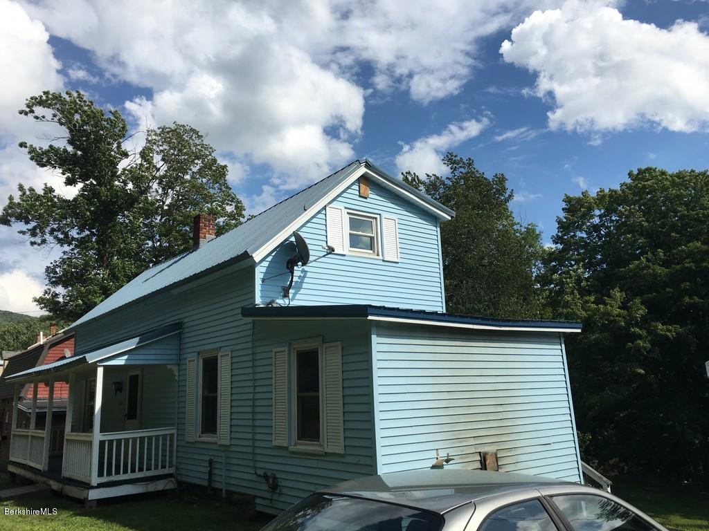 135 River Road Monroe, MA 01350 - Photo 3 of 21 a view of house with a yard