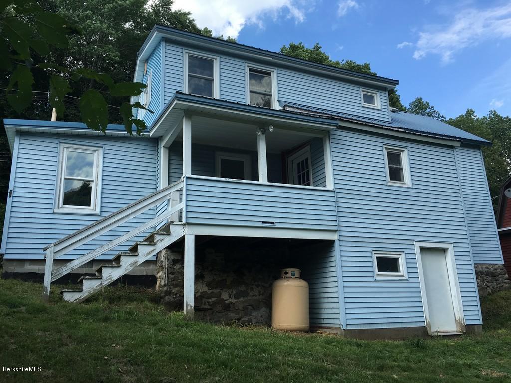 135 River Road Monroe, MA 01350 - Photo 4 of 21 a view of a house with a yard