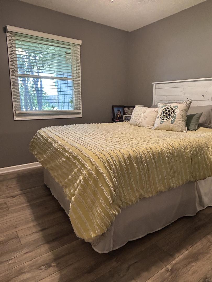 712 Kelley Drive Rochelle, IL 61068 - Photo 9 of 35 a bed sitting in a bedroom next to a window