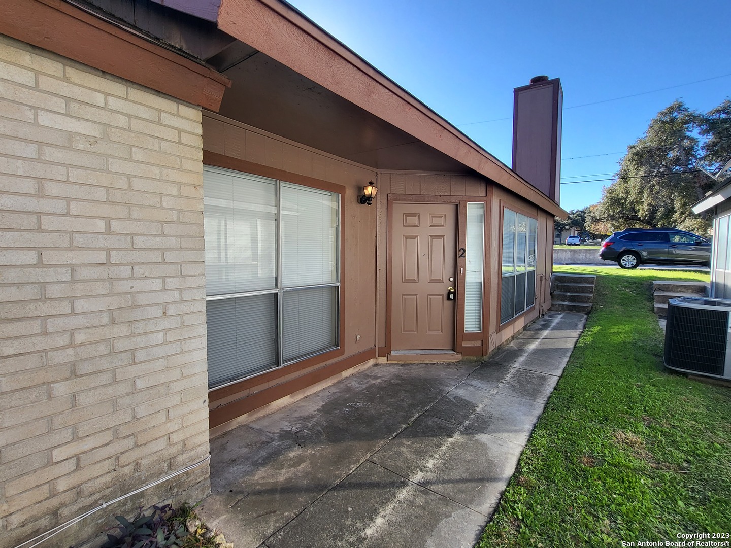 a view of a backyard with a garden