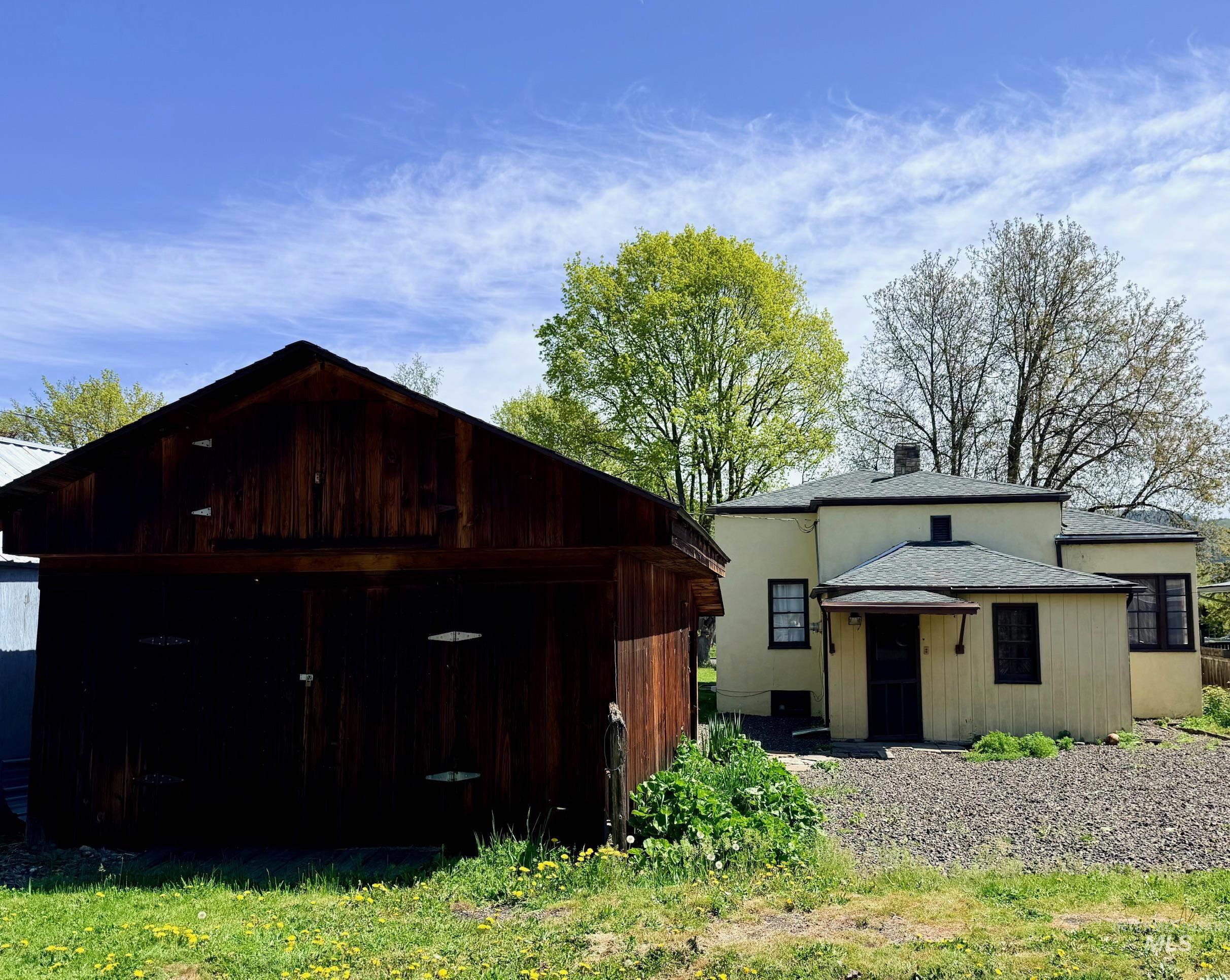 810 Main Street Kamiah, ID 83536 - Photo 18 of 19 View of front of house featuring an outbuilding and a detached garage