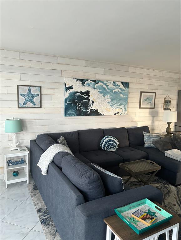 1370 South Ocean Boulevard, Unit 1005 Pompano Beach, FL 33062 - Photo 16 of 27 a living room with furniture and a couch