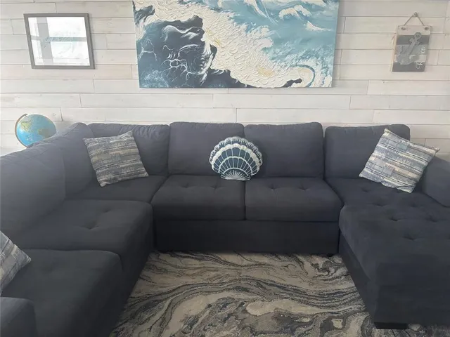 a workspace with furniture and a window