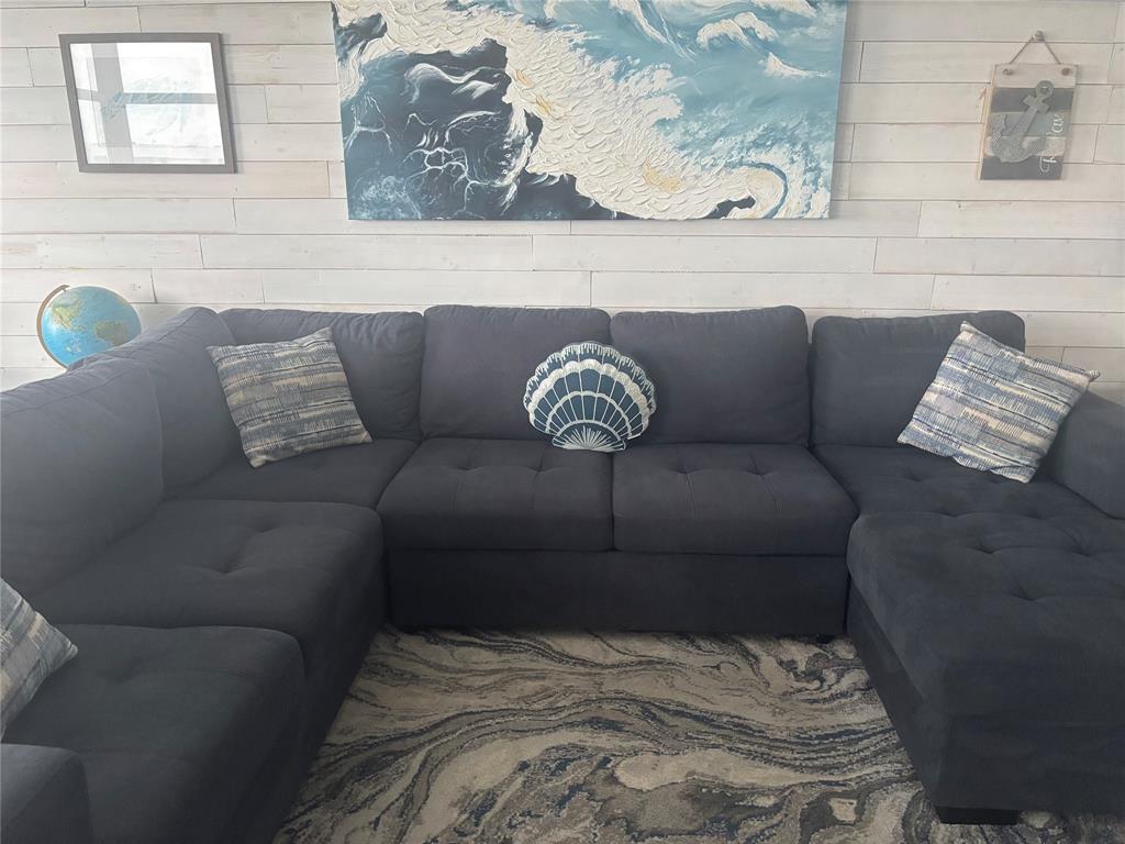 1370 South Ocean Boulevard, Unit 1005 Pompano Beach, FL 33062 - Photo 17 of 27 a living room with a couch