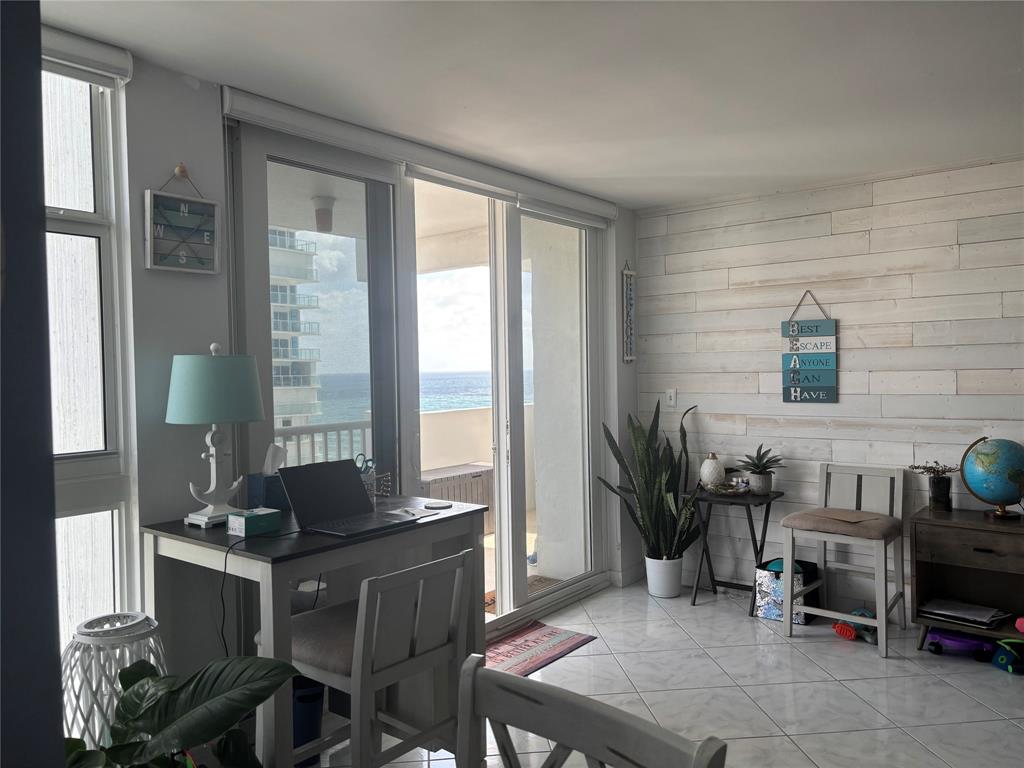 1370 South Ocean Boulevard, Unit 1005 Pompano Beach, FL 33062 - Photo 19 of 27 a workspace with furniture and a window