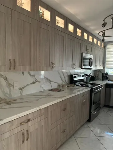 a bedroom with a bed and a table in it