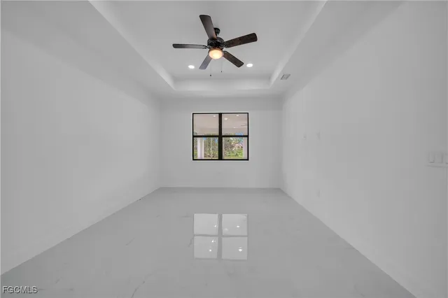 a bathroom with a shower toilet and sink