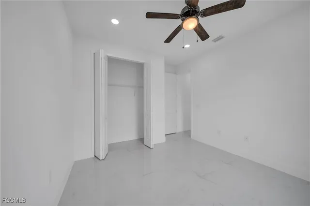 a view of an empty room with a garage