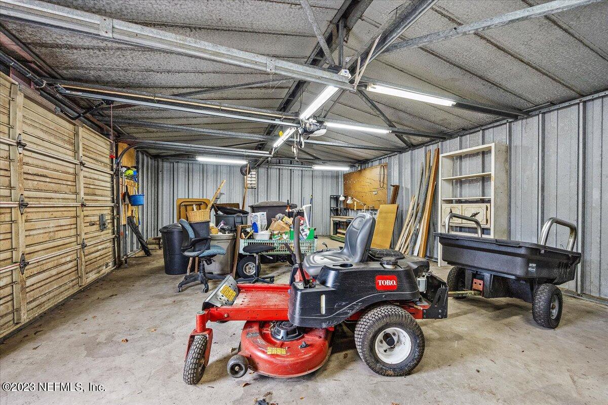 9006 Marlee Road Jacksonville, FL 32222 - Photo 12 of 18 a view of a room with gym equipment