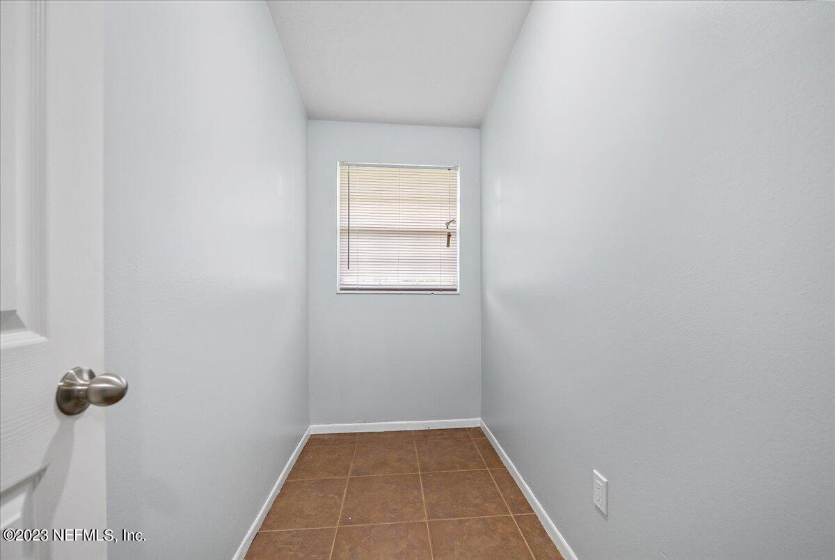 9006 Marlee Road Jacksonville, FL 32222 - Photo 9 of 18 a view of a room with window