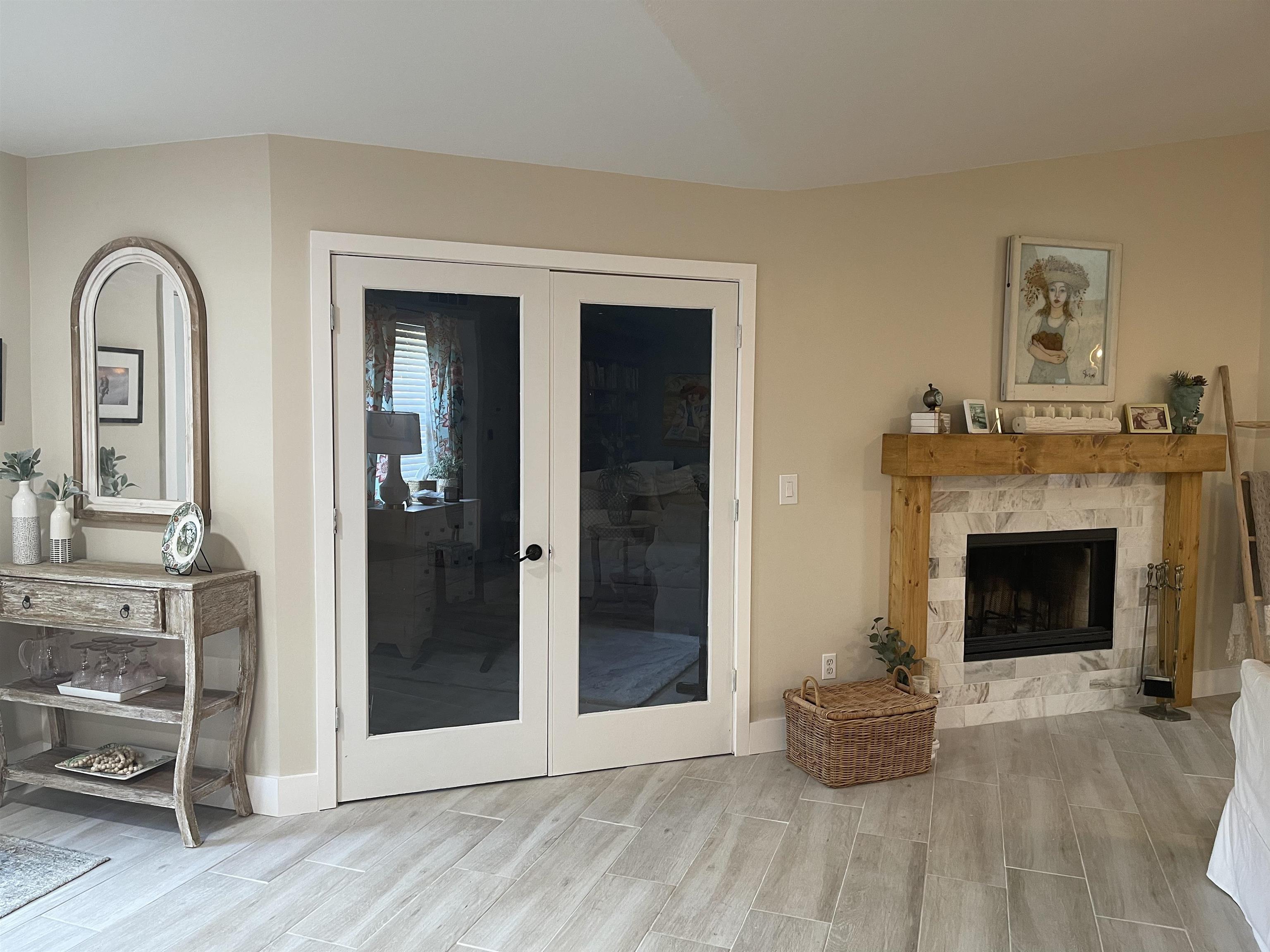 147 Swallow Road St. Augustine, FL 32086 - Photo 11 of 26 a living room with furniture and a fireplace