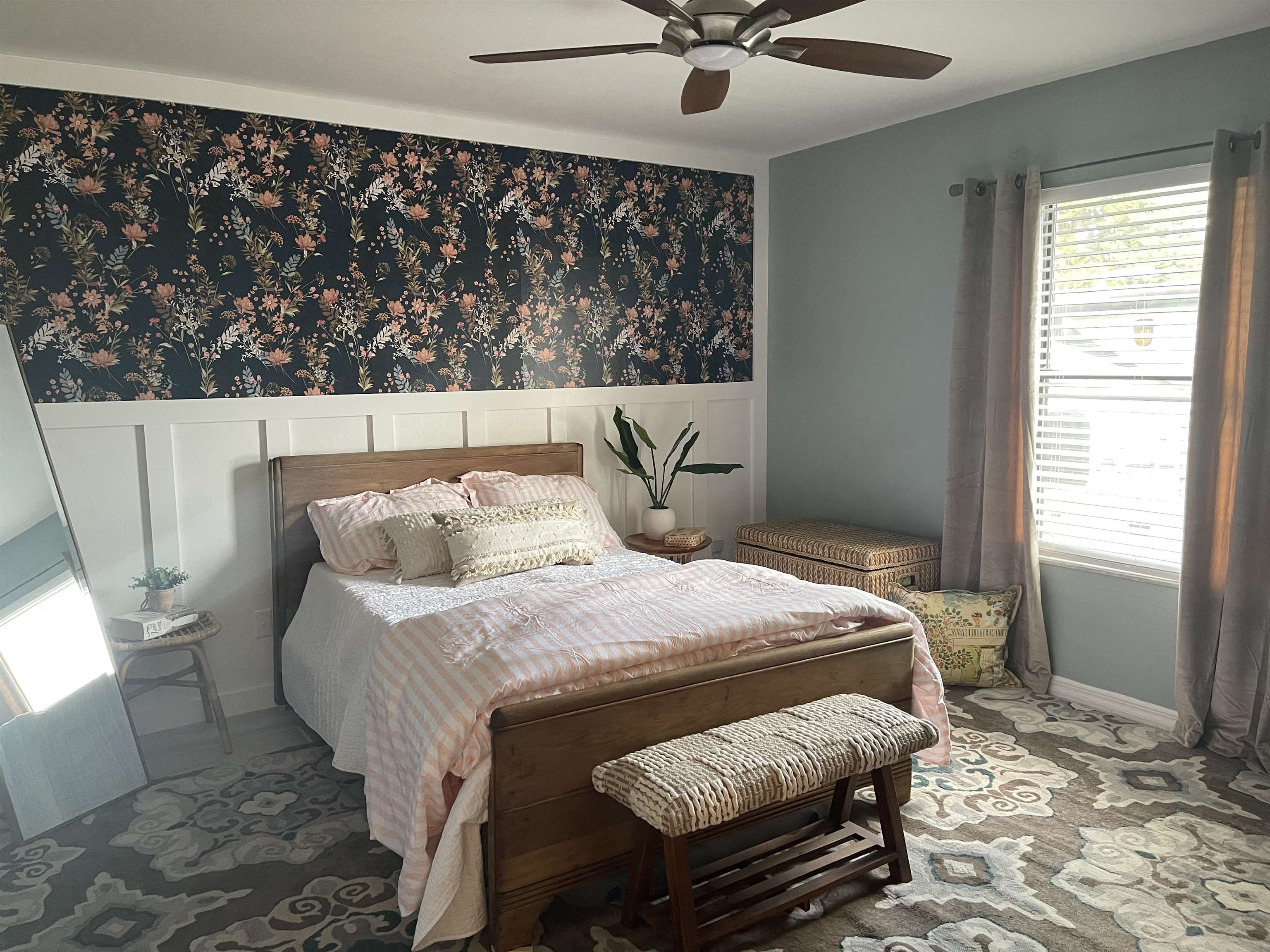 147 Swallow Road St. Augustine, FL 32086 - Photo 17 of 26 a bed sitting in a bedroom next to a window