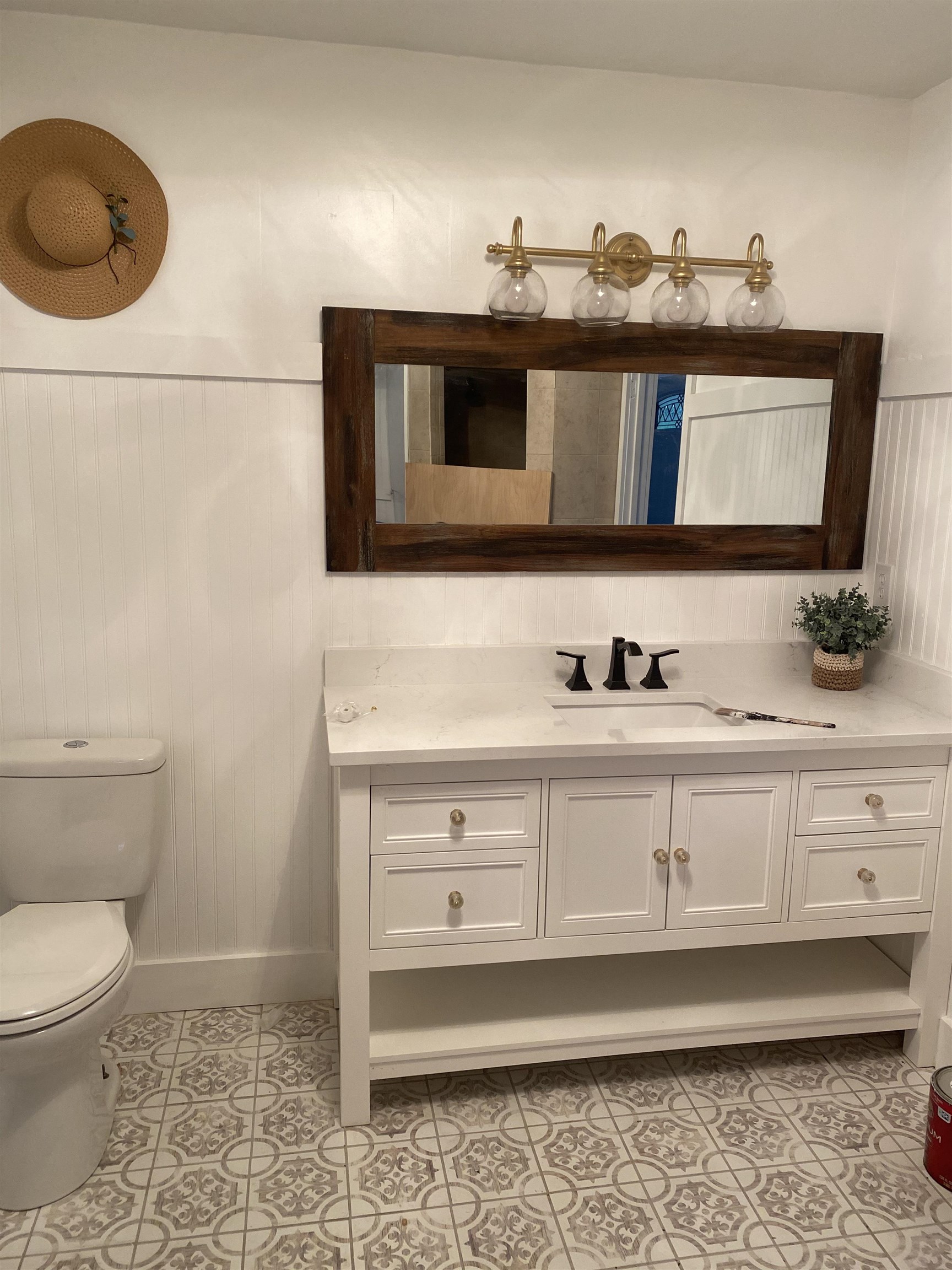 147 Swallow Road St. Augustine, FL 32086 - Photo 26 of 26 a bathroom with a sink a toilet and mirror