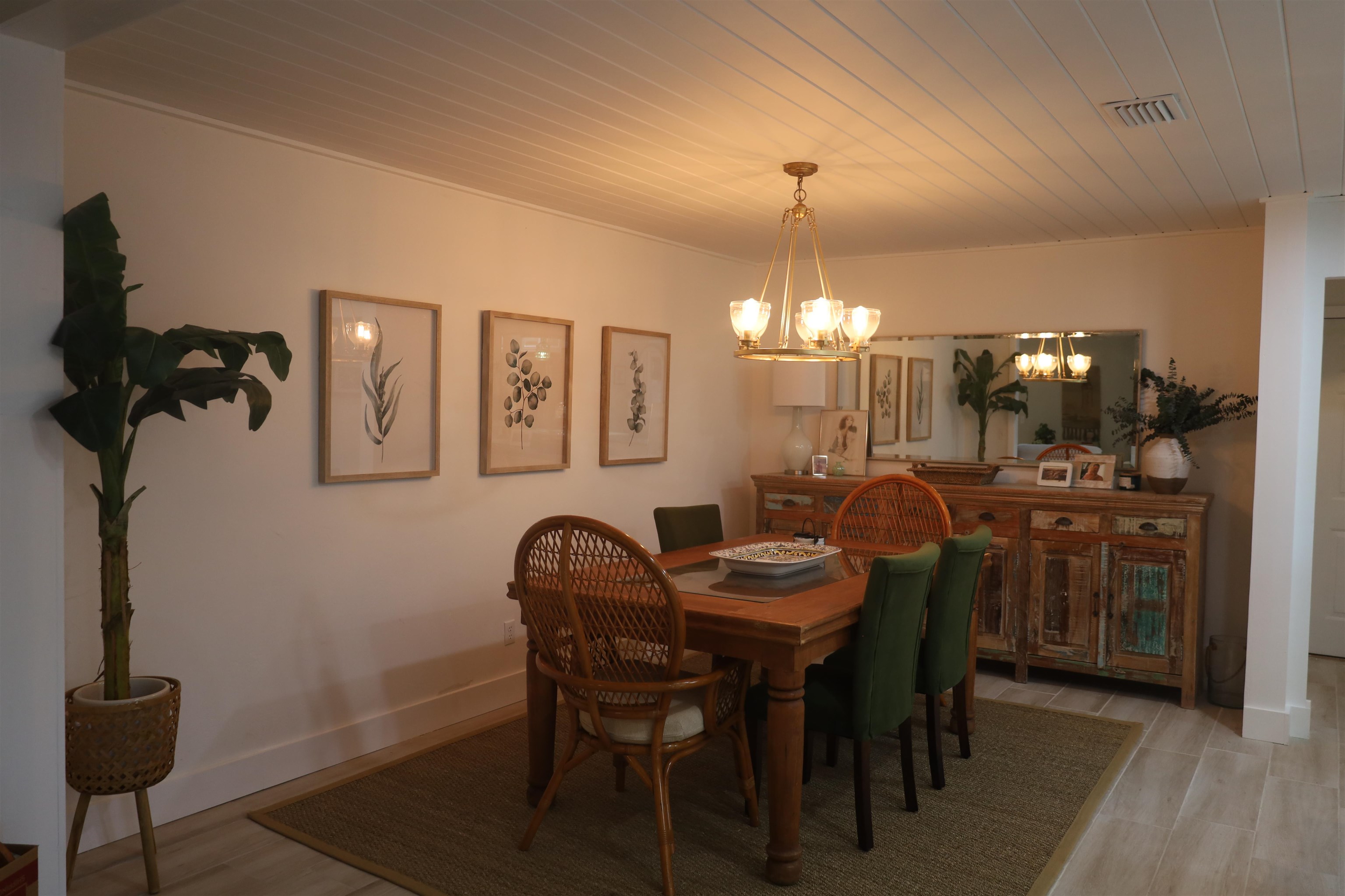 147 Swallow Road St. Augustine, FL 32086 - Photo 9 of 26 a view of a dining room with furniture and chandelier