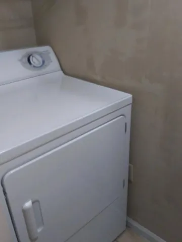 a close up view of washer and dryer