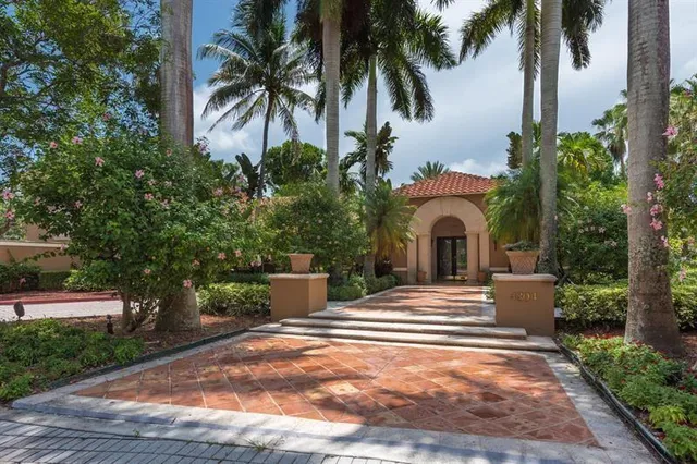 a view of outdoor space with garden and trees