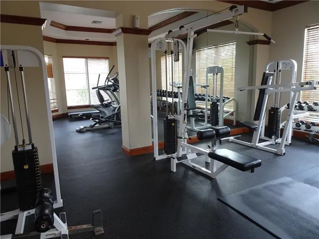 a view of a room with gym equipment