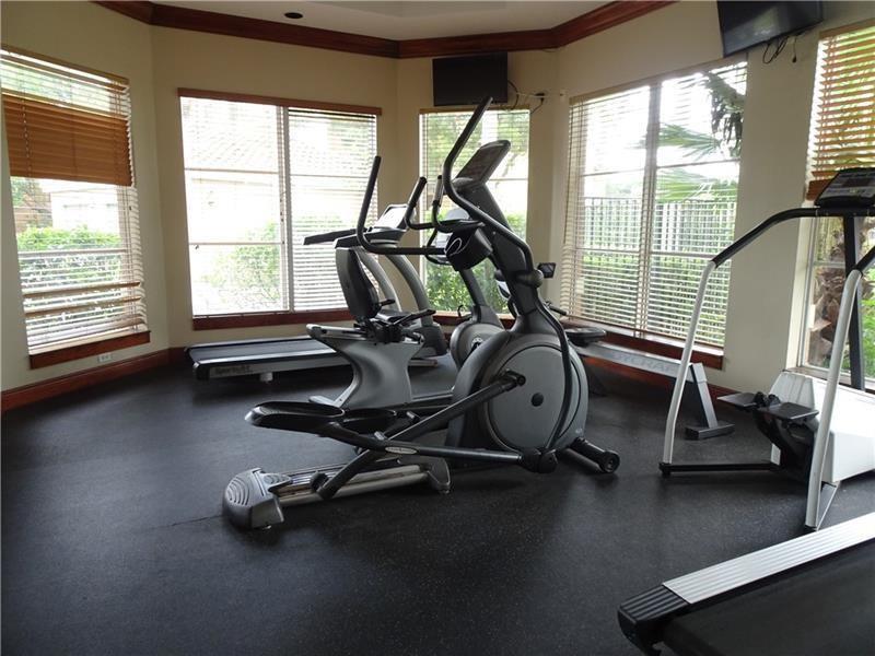 4816 Highway 7, Unit 11203 Coconut Creek, FL 33073 - Photo 23 of 35 a view of a room with gym equipment