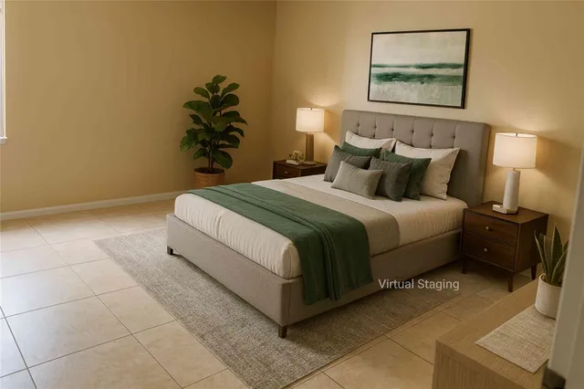 a bedroom with a bed and a painting on the wall