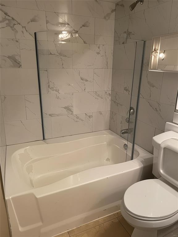 4816 Highway 7, Unit 11203 Coconut Creek, FL 33073 - Photo 9 of 35 a white toilet sitting next to a bath tub and shower