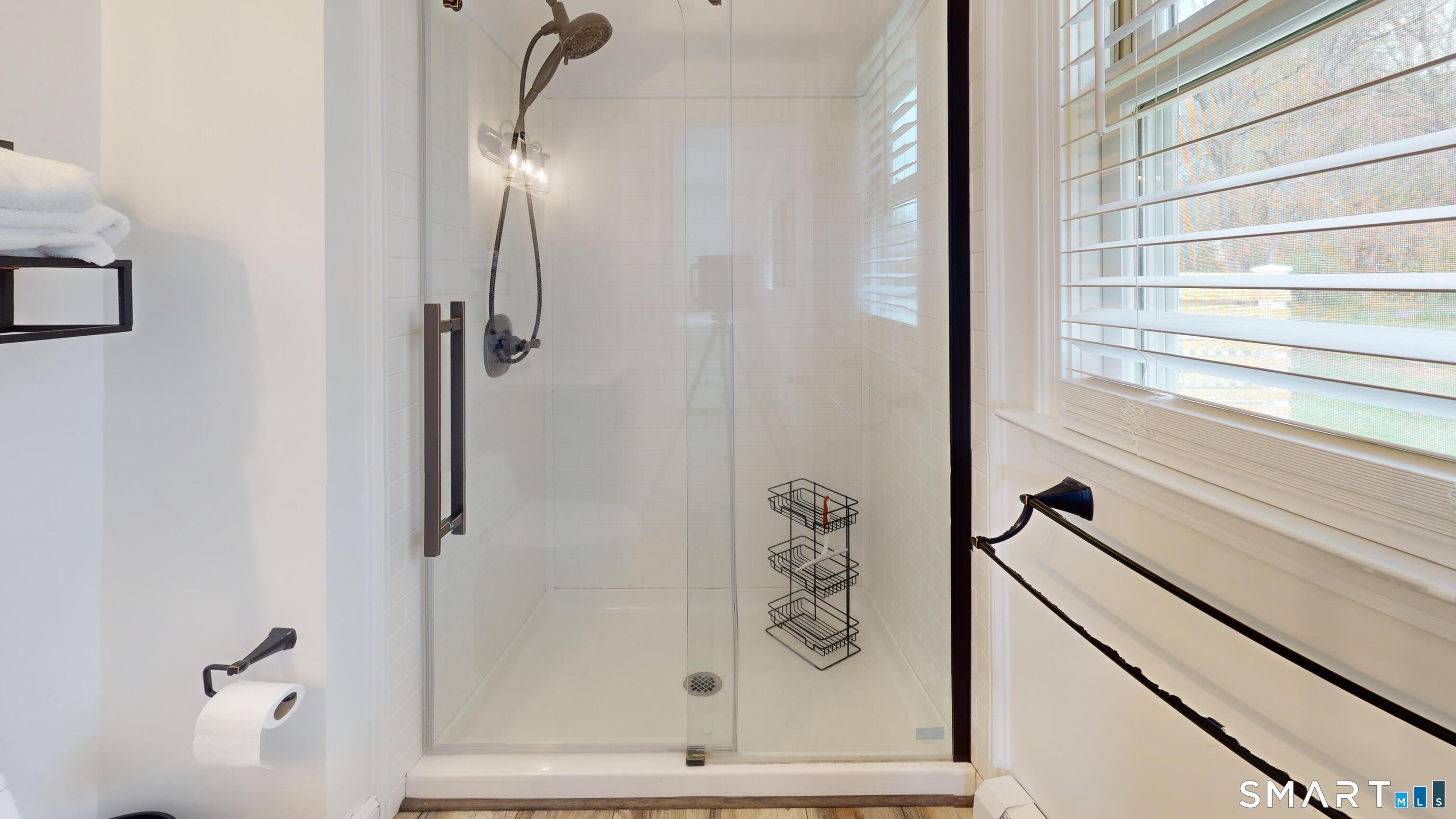 29 Deer Ridge Road Stonington, CT 06378 - Photo 13 of 35 a bathroom with a shower