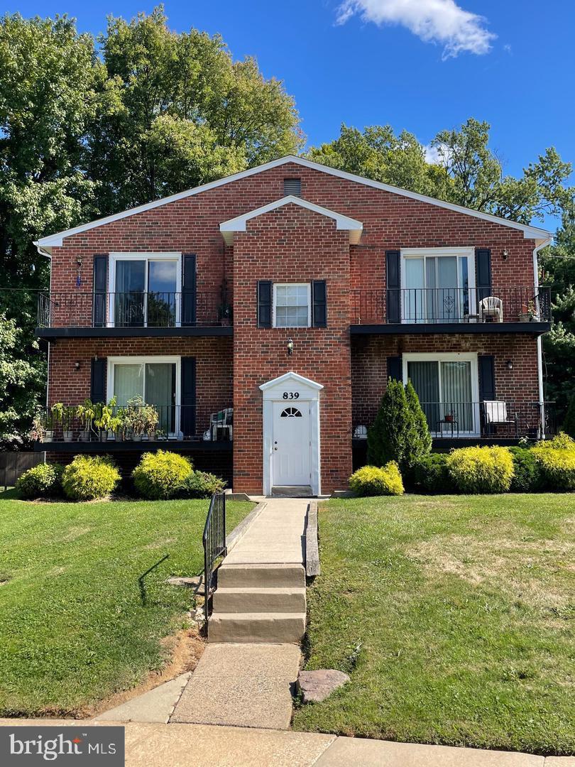 839 Garrett Lane Springfield, PA 19064 - Photo 1 of 20 Charming brick duplex with lush greenery.