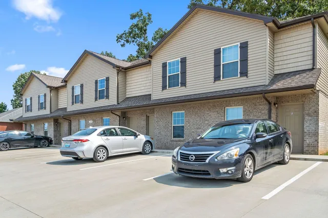 a car parked in front of a house